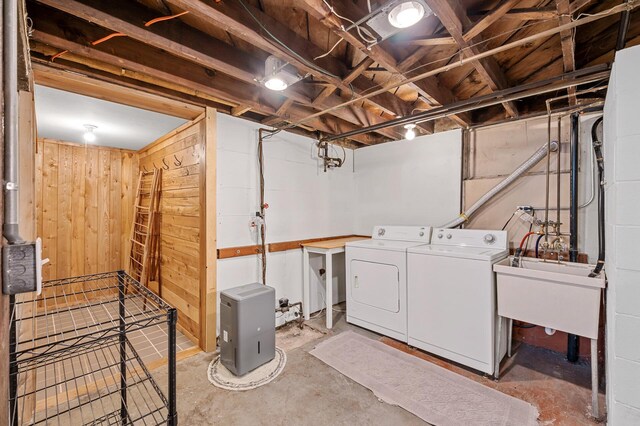 3841 Columbus Ave, Minneapolis, MN 55407 - unfinished basement featuring independent washer and dryer and wooden walls