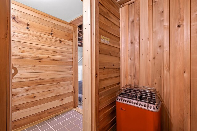 3841 Columbus Ave, Minneapolis, MN 55407 - relaxing sauna / steam room featuring wood walls and tile patterned floors