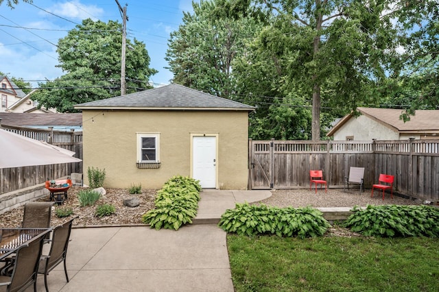 3841 Columbus Ave, Minneapolis, MN 55407 - view of outbuilding featuring a fenced backyard and outdoor dining space