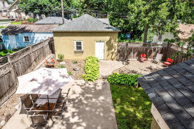 3841 Columbus Ave, Minneapolis, MN 55407 - fenced backyard with a patio and outdoor dining space