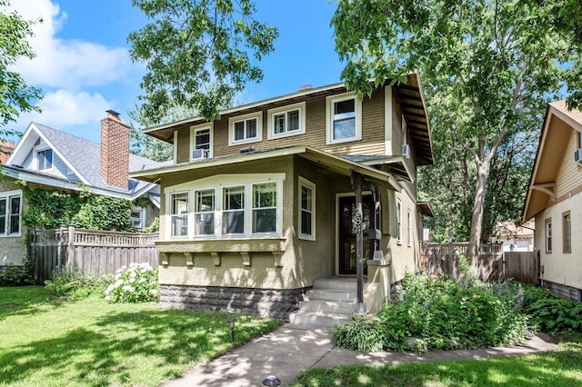 3841 Columbus Ave, Minneapolis, MN 55407 - view of front of property featuring stucco siding and a shingled roof