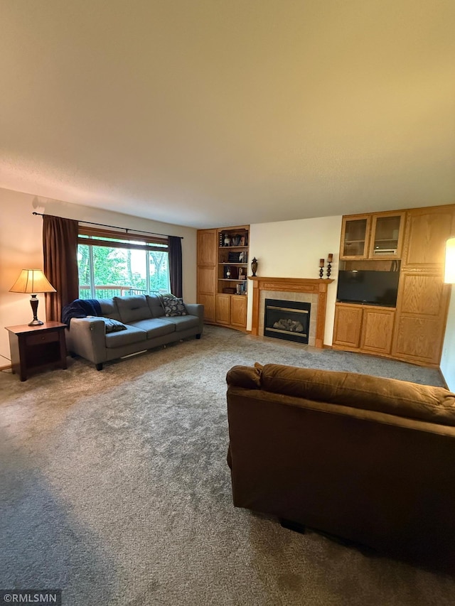2052 Wilhelm Ct, Shakopee, MN 55379 - carpeted living room with a tile fireplace
