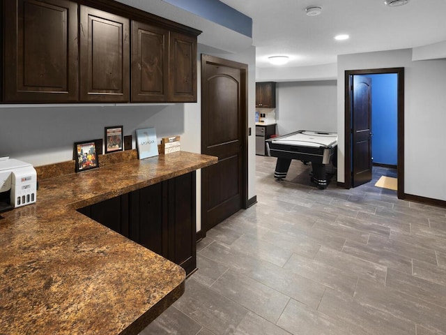 2052 Wilhelm Ct, Shakopee, MN 55379 - kitchen featuring dark countertops, dark brown cabinets, and recessed lighting