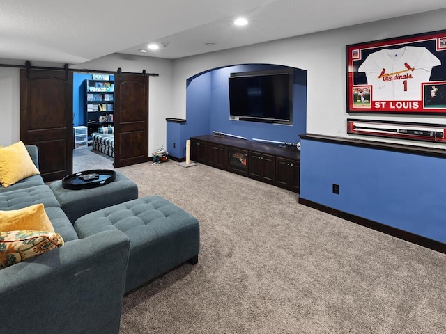 2052 Wilhelm Ct, Shakopee, MN 55379 - home theater with a barn door, carpet floors, and recessed lighting