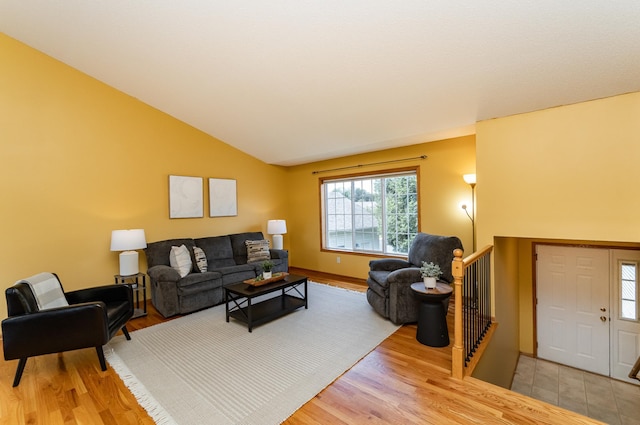 4626 Savannah Dr NW, Rochester, MN 55901 - living area featuring lofted ceiling and wood finished floors
