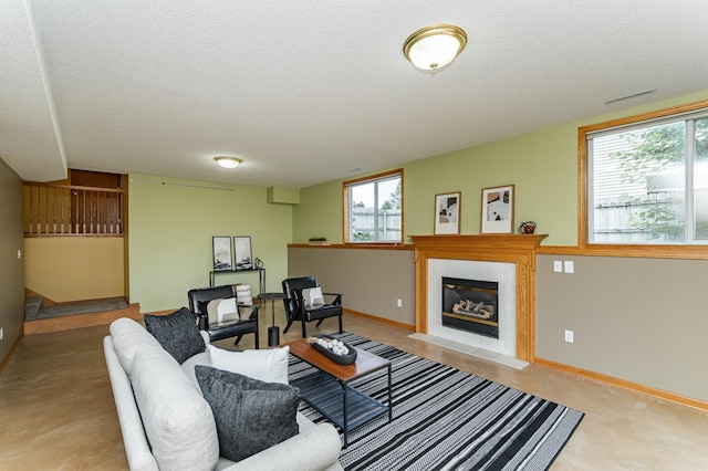 4626 Savannah Dr NW, Rochester, MN 55901 - living room with a textured ceiling and a fireplace
