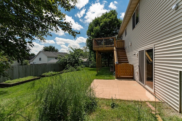 4626 Savannah Dr NW, Rochester, MN 55901 - fenced backyard with a patio, a wooden deck, and stairway