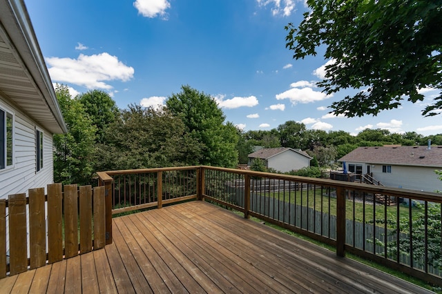 4626 Savannah Dr NW, Rochester, MN 55901 - wooden terrace featuring view of wooded area