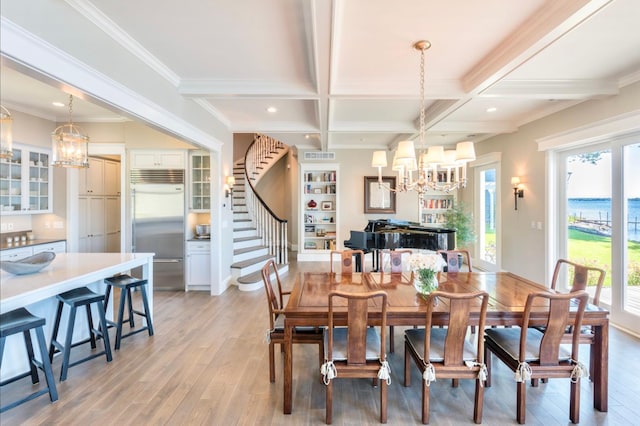 1105 Ferndale Rd W, Orono, MN 55391 - dining area featuring a chandelier, stairs, light wood-style flooring, beamed ceiling, and coffered ceiling