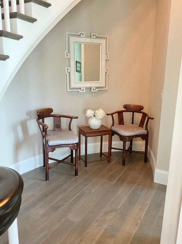1105 Ferndale Rd W, Orono, MN 55391 - sitting room with wood finished floors and arched walkways