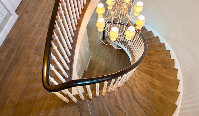 1105 Ferndale Rd W, Orono, MN 55391 - staircase featuring a chandelier