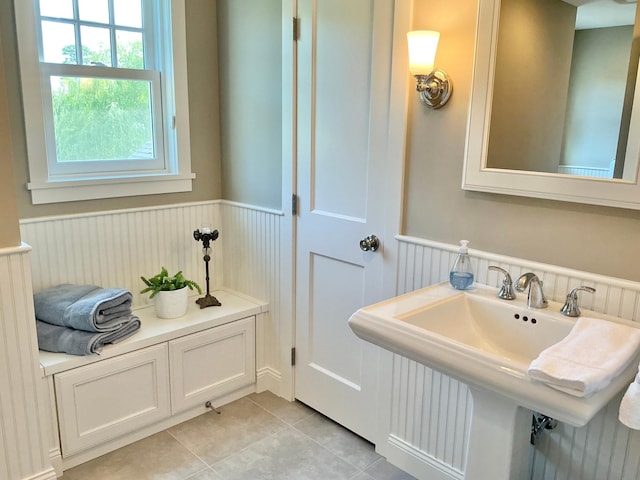 1105 Ferndale Rd W, Orono, MN 55391 - bathroom featuring a wainscoted wall and tile patterned flooring