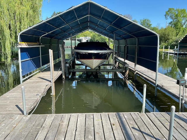 1105 Ferndale Rd W, Orono, MN 55391 - dock featuring boat lift and a water view