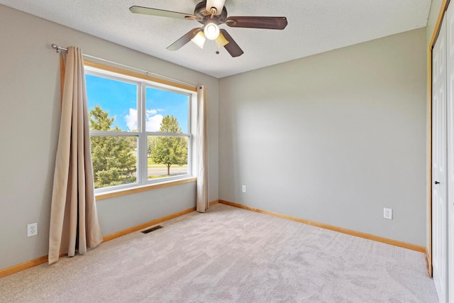 14192 Bayberry Trl, Rosemount, MN 55068 - empty room featuring light carpet and a ceiling fan