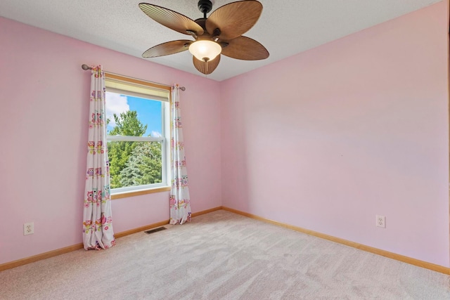 14192 Bayberry Trl, Rosemount, MN 55068 - carpeted spare room with ceiling fan and baseboards