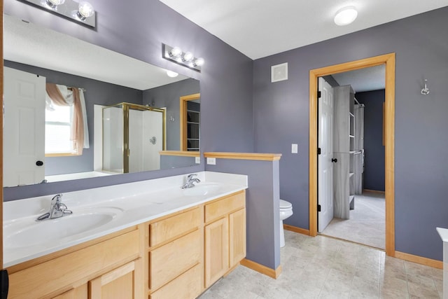 14192 Bayberry Trl, Rosemount, MN 55068 - bathroom featuring a shower stall and double vanity