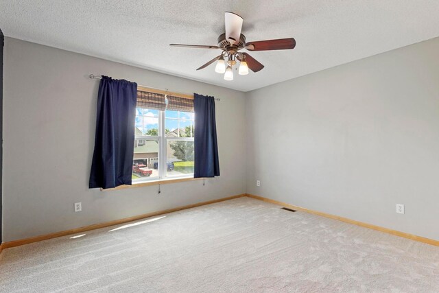 14192 Bayberry Trl, Rosemount, MN 55068 - carpeted empty room featuring a ceiling fan and a textured ceiling