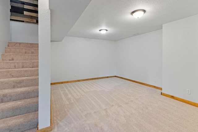 14192 Bayberry Trl, Rosemount, MN 55068 - finished basement featuring carpet flooring, stairs, and a textured ceiling