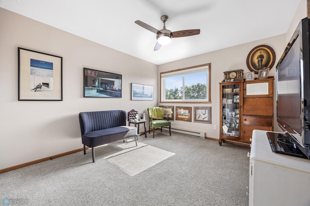 2636 18th St S Unit 8, Fargo, ND 58103 - living area with a baseboard heating unit, carpet flooring, and a ceiling fan