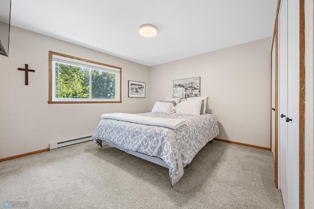 2636 18th St S Unit 8, Fargo, ND 58103 - carpeted bedroom with a baseboard radiator and baseboards