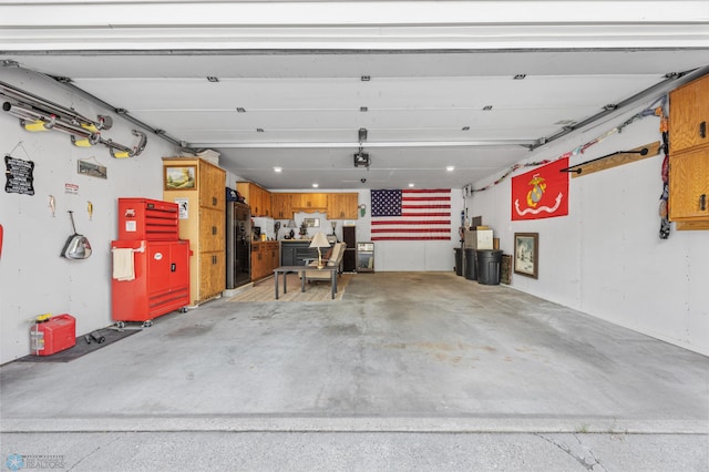 2636 18th St S Unit 8, Fargo, ND 58103 - garage with fridge and a garage door opener