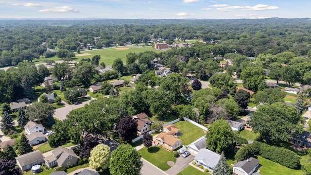 8300 Sheridan Ave S, Bloomington, MN 55431 - aerial perspective of suburban area with a heavily wooded area