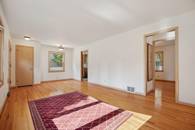 8300 Sheridan Ave S, Bloomington, MN 55431 - unfurnished room featuring light wood-style flooring and plenty of natural light