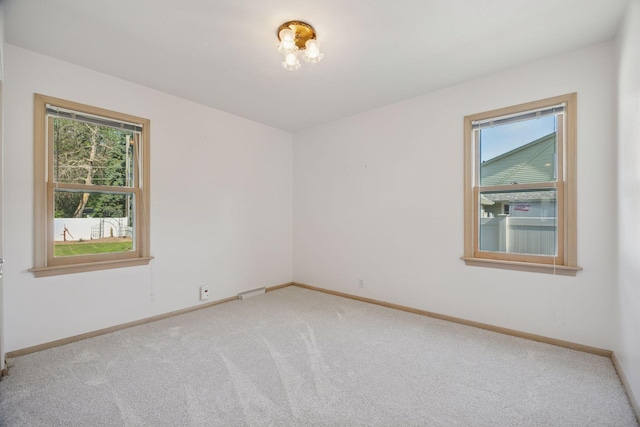 8300 Sheridan Ave S, Bloomington, MN 55431 - unfurnished room with healthy amount of natural light and light colored carpet