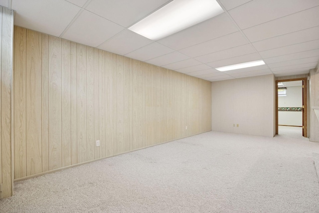 8300 Sheridan Ave S, Bloomington, MN 55431 - spare room with carpet floors, a drop ceiling, and wood walls