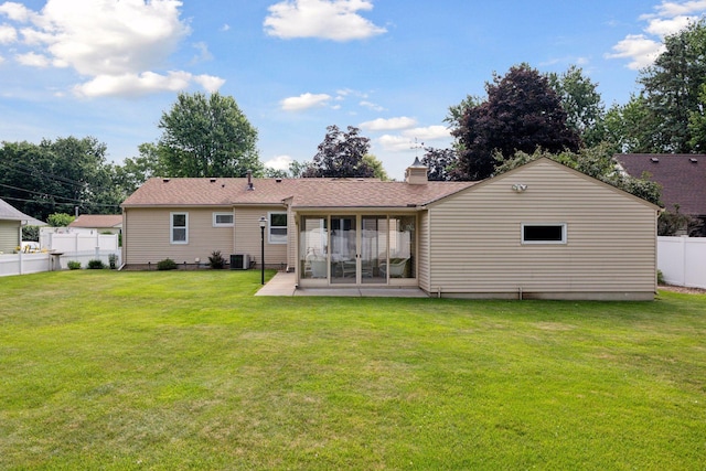 8300 Sheridan Ave S, Bloomington, MN 55431 - back of property featuring a chimney, a sunroom, and a patio area