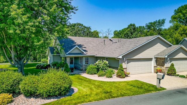 10 Cree Point Dr, Mankato, MN 56001 - view of front facade featuring a garage, a front lawn, driveway, and roof with shingles