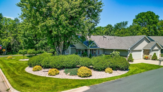 10 Cree Point Dr, Mankato, MN 56001 - view of front facade with a garage, a front yard, and concrete driveway