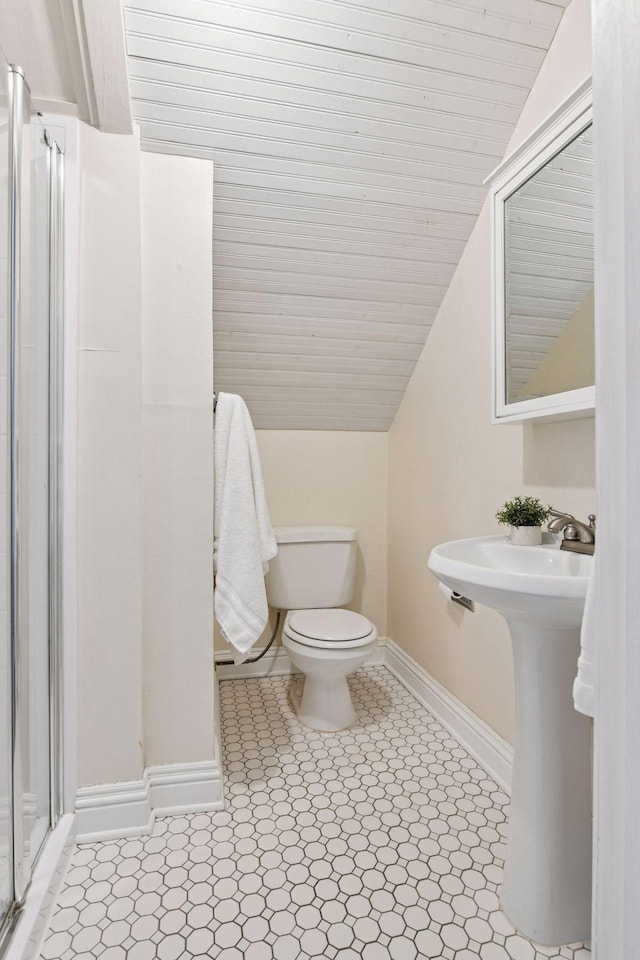 5917 Oliver Ave S, Minneapolis, MN 55419 - bathroom featuring a stall shower and vaulted ceiling