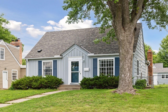 5917 Oliver Ave S, Minneapolis, MN 55419 - view of front facade with board and batten siding and roof with shingles