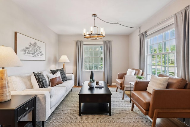 5917 Oliver Ave S, Minneapolis, MN 55419 - living area featuring a chandelier and light wood-style flooring