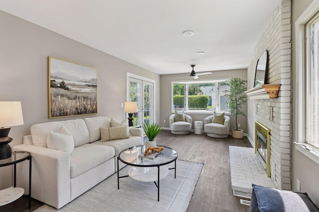 5917 Oliver Ave S, Minneapolis, MN 55419 - living area featuring a fireplace, a ceiling fan, and wood finished floors