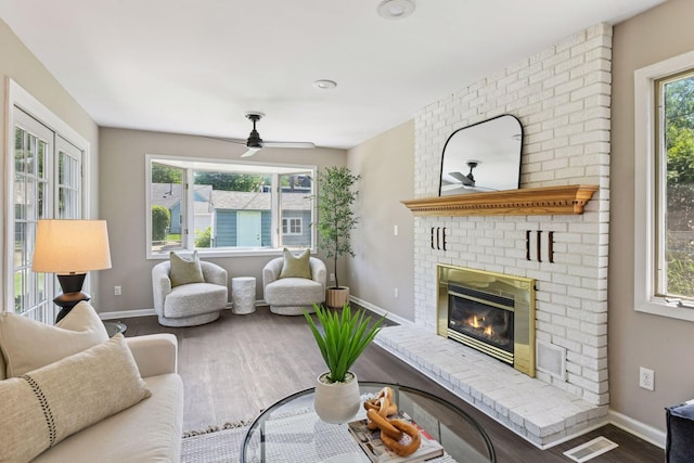 5917 Oliver Ave S, Minneapolis, MN 55419 - living area featuring wood finished floors, a fireplace, and ceiling fan
