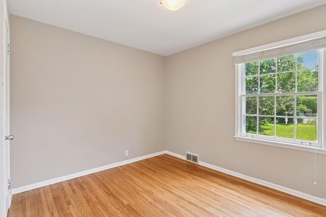 5917 Oliver Ave S, Minneapolis, MN 55419 - unfurnished room with light wood finished floors and healthy amount of natural light