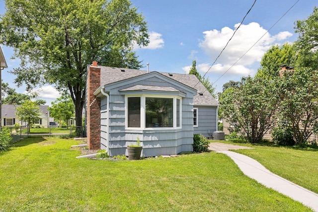 5917 Oliver Ave S, Minneapolis, MN 55419 - view of front of home featuring a chimney and a shingled roof