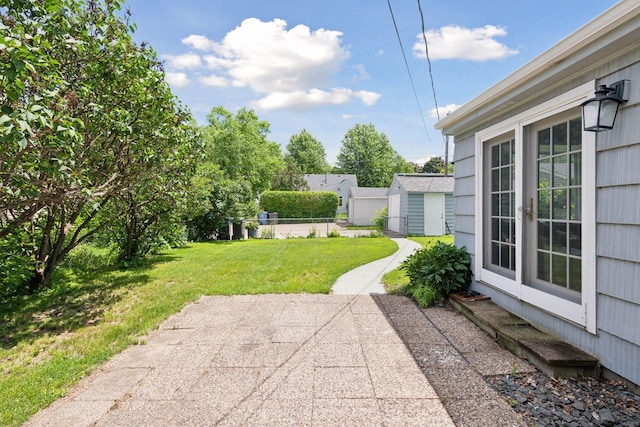 5917 Oliver Ave S, Minneapolis, MN 55419 - view of green lawn with a patio area