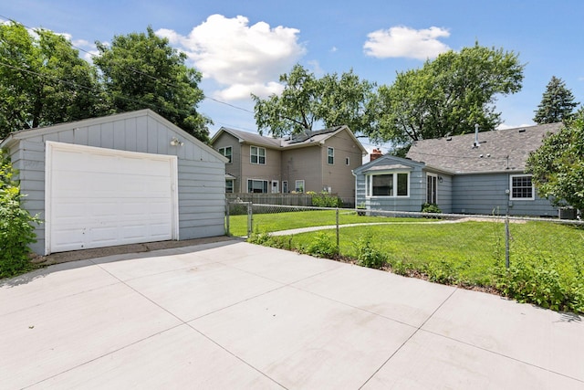 5917 Oliver Ave S, Minneapolis, MN 55419 - view of front of property with concrete driveway, an outdoor structure, a garage, and board and batten siding