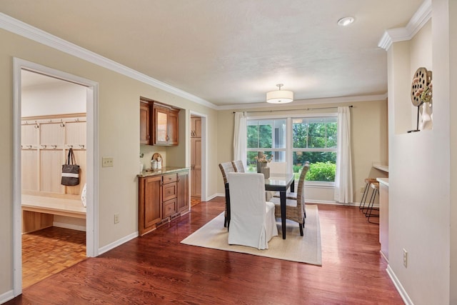 3918 Willmatt Hl, Minnetonka, MN 55305 - dining room featuring ornamental molding and dark wood-type flooring