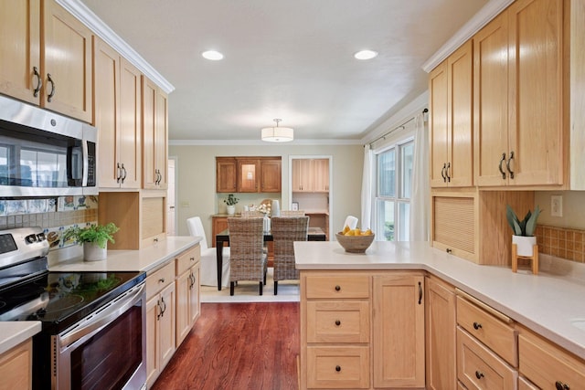 3918 Willmatt Hl, Minnetonka, MN 55305 - kitchen with appliances with stainless steel finishes, a peninsula, light countertops, light brown cabinets, and ornamental molding