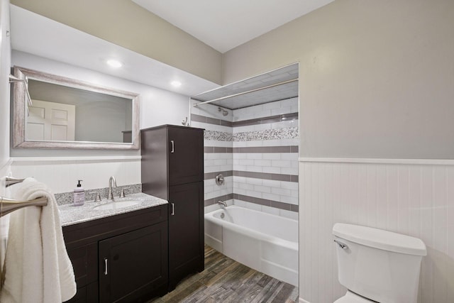 3918 Willmatt Hl, Minnetonka, MN 55305 - full bathroom with wood finished floors, washtub / shower combination, wainscoting, and vanity