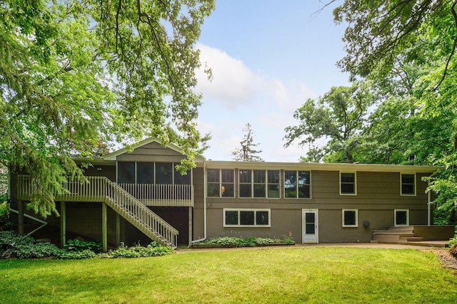 3918 Willmatt Hl, Minnetonka, MN 55305 - back of property with a sunroom, stairway, and a lawn