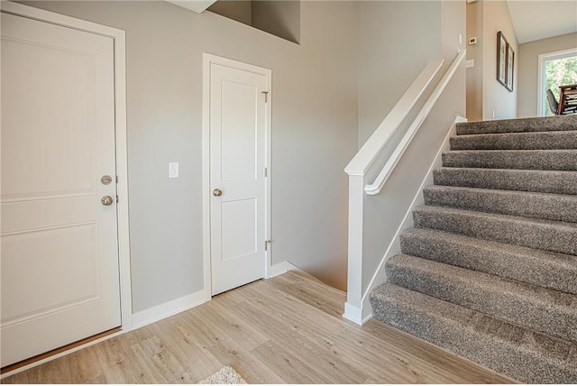 6006 Fuller Cir, Wyoming, MN 55092 - stairway with wood finished floors and baseboards