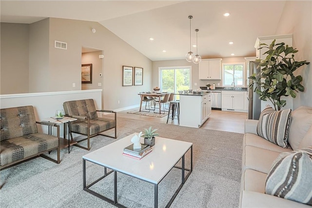 6006 Fuller Cir, Wyoming, MN 55092 - living area with vaulted ceiling and recessed lighting