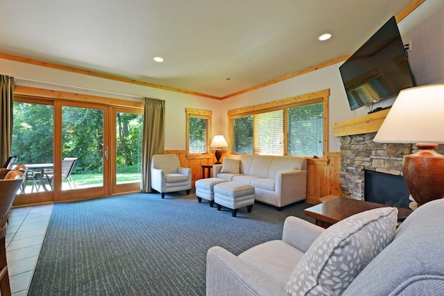 24909 Sandy Ln, Bay Lake Twp, MN 56444 - living area featuring a wainscoted wall, a fireplace, recessed lighting, and wood walls
