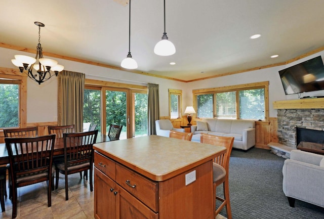 24909 Sandy Ln, Bay Lake Twp, MN 56444 - kitchen with open floor plan, wainscoting, plenty of natural light, a chandelier, and a center island