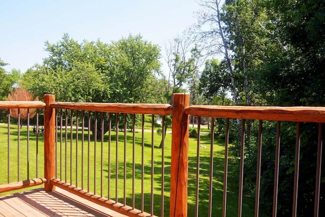 24909 Sandy Ln, Bay Lake Twp, MN 56444 - wooden deck featuring a lawn